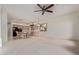 Open concept floorplan with the living room connected to a kitchen island featuring breakfast bar seating at 18 E Paint Your Wagon Trl, Phoenix, AZ 85085