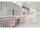 Bright main bathroom features double sinks, a garden tub, a separate shower and tile flooring at 18 E Paint Your Wagon Trl, Phoenix, AZ 85085