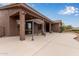 Back patio with lounge area, offering a serene outdoor space to relax and enjoy desert views at 18 E Paint Your Wagon Trl, Phoenix, AZ 85085