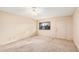 Neutral bedroom with large window and carpet at 1857 S El Marino Cir, Mesa, AZ 85202