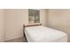 Bedroom with large window and wood blinds at 1857 S El Marino Cir, Mesa, AZ 85202
