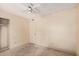 Bedroom featuring neutral walls, carpeted floors and a standard closet for ample storage at 1857 S El Marino Cir, Mesa, AZ 85202