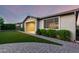 Home exterior featuring landscaped yard and walkway leading to open garage at 21408 S 224Th Pl, Queen Creek, AZ 85142