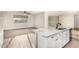 Modern kitchen with an island featuring a sink, granite countertops and stainless steel appliances at 21408 S 224Th Pl, Queen Creek, AZ 85142