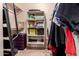 Walk-in closet featuring shelving, a ladder, and ample storage space for clothes and accessories at 2315 W Beverly Rd, Phoenix, AZ 85041