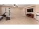 Inviting living space with sliding glass doors, neutral paint, modern ceiling fan, and access to backyard at 2315 W Beverly Rd, Phoenix, AZ 85041