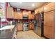 Well-equipped kitchen with stainless steel appliances, ample storage, and a functional layout at 26678 N Babbling Brook Dr, Phoenix, AZ 85083