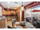 Well-lit kitchen featuring wooden cabinets, stainless steel appliances, and a view of a lovely outdoor patio at 26678 N Babbling Brook Dr, Phoenix, AZ 85083
