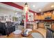 Open-concept kitchen and living area with seamless flow, ideal for entertaining and everyday living at 26678 N Babbling Brook Dr, Phoenix, AZ 85083
