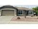 Inviting single-story home featuring low-maintenance desert landscaping and an attached two-car garage at 3176 E Palm Beach Dr, Chandler, AZ 85249