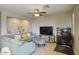 Cozy living room with a large sectional, decorative accents, and dedicated workspace at 3450 E Milky Way, Gilbert, AZ 85295
