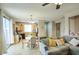 Open concept living area with lots of natural light and a view of the adjacent kitchen at 3450 E Milky Way, Gilbert, AZ 85295