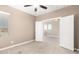Carpeted bedroom with open doorway showing the upstairs landing at 36145 N Desert Tea Dr, Queen Creek, AZ 85140