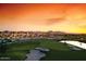 Picturesque golf course with water features and mountain views provides a scenic and challenging playing experience at 36145 N Desert Tea Dr, Queen Creek, AZ 85140