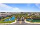 Aerial view of the community featuring mature trees, ponds and walking paths at 4077 S Sabrina Dr # 48, Chandler, AZ 85248