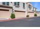 Townhome garages with neutral paint, and maintained landscaping at 4077 S Sabrina Dr # 48, Chandler, AZ 85248