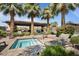 Community hot tub offers a relaxing oasis surrounded by lush landscaping and palm trees at 4077 S Sabrina Dr # 48, Chandler, AZ 85248