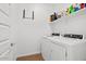 Well-lit laundry room features a modern washer and dryer and plenty of storage space at 4077 S Sabrina Dr # 48, Chandler, AZ 85248