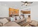 Open-concept living room flowing into the kitchen, creating a seamless space for modern living and entertaining at 4077 S Sabrina Dr # 48, Chandler, AZ 85248