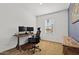 Home office features neutral walls and carpet, and modern desk and chair with great natural light at 4077 S Sabrina Dr # 48, Chandler, AZ 85248