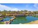 Scenic community pond with lush landscaping, waterfall feature, and a beautiful view of the surrounding neighborhood at 4077 S Sabrina Dr # 48, Chandler, AZ 85248