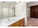 Bathroom boasts a large mirror and vanity and a single sink at 4633 E Chaparosa Way, Cave Creek, AZ 85331