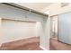 Spacious walk-in closet offers plenty of storage with built-in shelving and racks at 4633 E Chaparosa Way, Cave Creek, AZ 85331