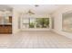 Bright living area featuring neutral walls, tile floors, and large windows at 4633 E Chaparosa Way, Cave Creek, AZ 85331