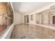 Living room with tile floors, light walls, and view to the courtyard at 4633 E Chaparosa Way, Cave Creek, AZ 85331