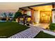 Exterior view of home with brick and siding, a welcoming front porch, and well-maintained landscaping at 4833 N 38Th St, Phoenix, AZ 85018