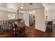 Versatile living room with hardwood floors, which transitions into the kitchen area at 4944 W Vista Ave, Glendale, AZ 85301