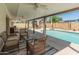 Backyard featuring a pool, seating area, and covered patio for entertaining at 4944 W Vista Ave, Glendale, AZ 85301