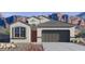 Charming single-story home with a two-car garage in front of beautiful mountain views at 5012 S 106Th Ln, Tolleson, AZ 85353