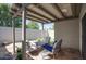 Charming backyard patio with comfortable seating, ideal for outdoor entertaining and relaxation at 609 E Royal Palm S Sq, Phoenix, AZ 85020