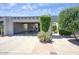 Charming single-story home with a two-car carport, desert landscaping, and a brick pathway at 609 E Royal Palm S Sq, Phoenix, AZ 85020
