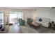 Spacious living room with sliding glass doors leading to an outdoor patio at 609 E Royal Palm S Sq, Phoenix, AZ 85020