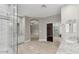 Bathroom featuring a walk-in shower and a vanity at 614 E Benrich Dr, Gilbert, AZ 85295