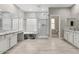 Spacious bathroom featuring a double vanity, walk-in shower, and a tub at 614 E Benrich Dr, Gilbert, AZ 85295