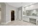 Bathroom featuring a vanity and a walk-in closet at 614 E Benrich Dr, Gilbert, AZ 85295