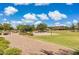 Community park and playground with trees and green spaces at 614 E Benrich Dr, Gilbert, AZ 85295