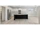 Modern kitchen featuring stainless steel appliances, subway tile backsplash, and a large island at 614 E Benrich Dr, Gilbert, AZ 85295