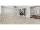 Open-concept living room featuring tile floors, a modern fireplace, and large windows allowing plenty of natural light at 614 E Benrich Dr, Gilbert, AZ 85295