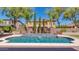 Beautiful backyard pool with fountains and lush landscaping at 614 E Benrich Dr, Gilbert, AZ 85295