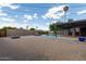 Spacious backyard with a well-maintained pool, cozy fire pit area, and ample space for outdoor activities at 6810 E Almeria Rd, Scottsdale, AZ 85257