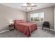 This bedroom has neutral tones and a window with natural light at 6810 E Almeria Rd, Scottsdale, AZ 85257