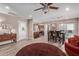 Open-concept dining area featuring wood-look tile floors and a dining table with chairs at 6810 E Almeria Rd, Scottsdale, AZ 85257