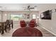 Inviting living room with warm colors, cozy seating and wood-style flooring at 6810 E Almeria Rd, Scottsdale, AZ 85257