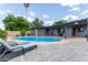 Inviting backyard pool area with lounge chairs and covered patio offering a relaxing outdoor space at 6810 E Almeria Rd, Scottsdale, AZ 85257