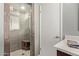 Elegant shower with stone accents and built-in bench at 6810 E Almeria Rd, Scottsdale, AZ 85257