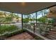 Relaxing balcony offers serene neighborhood views, greenery, and a charming railing at 7161 E Rancho Vista Dr # 1013, Scottsdale, AZ 85251